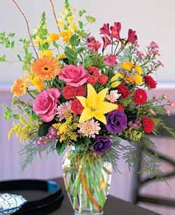 Fort Worth Flower Delivery The Dazzler Gordon Boswell Flowers Hot Pink Yellow And Purple Flowers In A Tall Gl Vase